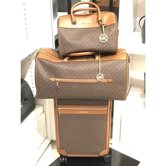 Michael kors rolling carry top on luggage